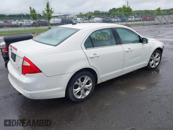 2012 Ford Fusion SE z VIN 3FAHP0HA4CR261668, wystawiony jako IAAI lot #42318115 z przebiegiem 81 923 mil mil oraz . Historia ofert i sprzedaży dostępna na DreamBid. Obrazek 4.