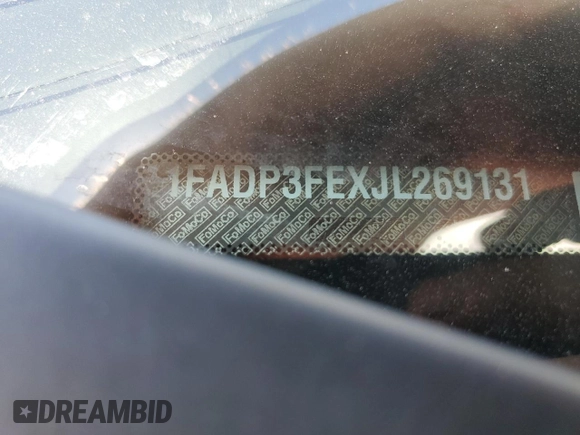 2018 Ford Focus SE with VIN 1FADP3FEXJL269131, listed as a Copart auction lot 55894765 with 33,752 mi miles and Salvage title. Bid and sale history available at DreamBid. Image 12.