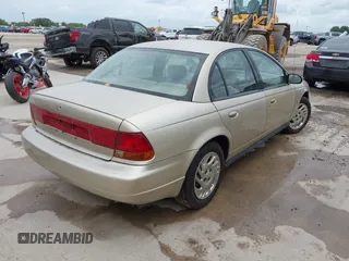 1998 Saturn SL with VIN 1G8ZK5275WZ142402, listed as a IAAI auction lot 42534417 with 181,283 mi miles and . Bid and sale history available at DreamBid. Image 4.