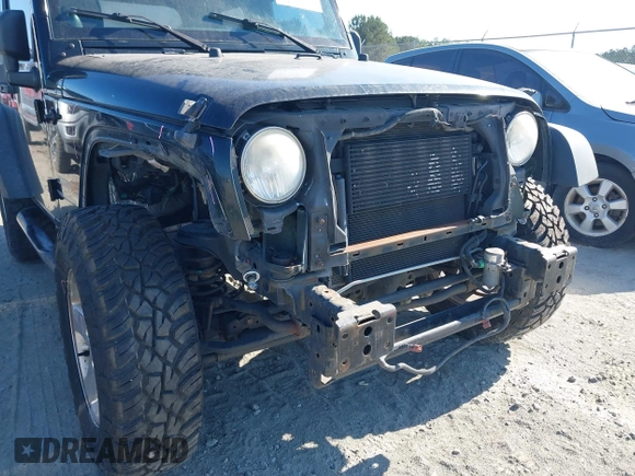 2012 Jeep Wrangler Sport with VIN 1C4AJWAG0CL247103, listed as a IAAI auction lot 42181637 with 159,003 mi miles and . Bid and sale history available at DreamBid. Image 6.