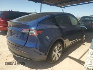 2023 Tesla Model Y Long Range with VIN 7SAYGDEE7PA112865, listed as a Copart auction lot 54626685 with 10,720 mi miles and Salvage Title. Bid and sale history available at DreamBid. Image 3.