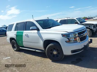 2015 Chevrolet Tahoe Commercial z VIN 1GNLC2EC8FR255526, wystawiony jako IAAI lot #42538320 z przebiegiem 165 502 mil mil oraz . Historia ofert i sprzedaży dostępna na DreamBid. Obrazek 13.
