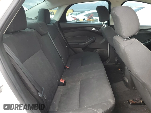 2016 Ford Focus SE with VIN 1FADP3F21GL284681, listed as a Copart auction lot 51140975 with 141,704 mi miles and Salvage Title. Bid and sale history available at DreamBid. Image 10.