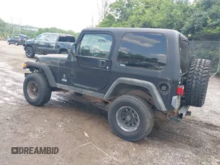 2004 Jeep Wrangler Sport z VIN 1J4FA49S94P792689, wystawiony jako IAAI lot #42394196 z przebiegiem Nie podano mil oraz . Historia ofert i sprzedaży dostępna na DreamBid. Obrazek 3.