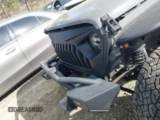 2019 Jeep Wrangler Unlimited Sport Altitude with VIN 1C4HJXDG3KW639148, listed as a IAAI auction lot 41933844 with 57,184 mi miles and . Bid and sale history available at DreamBid. Image 17.
