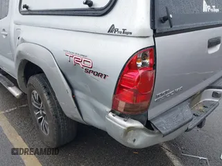 2007 Toyota Tacoma z VIN 3TMLU42N77M009397, wystawiony jako IAAI lot #41805139 z przebiegiem 256 744 mil mil oraz . Historia ofert i sprzedaży dostępna na DreamBid. Obrazek 6.