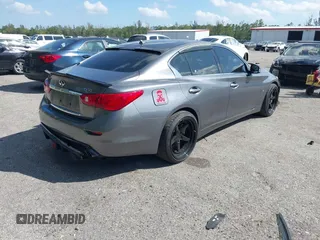 2014 Infiniti Q50 Sport with VIN JN1BV7AP4EM670443, listed as a IAAI auction lot 41801219 with 98,719 mi miles and . Bid and sale history available at DreamBid. Image 4.
