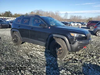 2022 Jeep Cherokee Trailhawk with VIN 1C4PJMBX7ND550115, listed as a Copart auction lot 41688785 with 25,272 mi miles and Salvage Title. Bid and sale history available at DreamBid. Image 4.