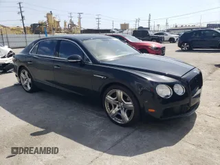 2014 Bentley Flying Spur z VIN SCBEC9ZA2EC095912, wystawiony jako Copart lot #51672955 z przebiegiem 42 555 mil mil oraz Szkoda całkowita • Salvage title. Historia ofert i sprzedaży dostępna na DreamBid. Obrazek 4.
