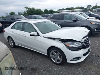 2014 Mercedes-Benz E 350 Luxury with VIN WDDHF8JB5EB040219, listed as a IAAI auction lot 42771799 with 65,454 mi miles and . Bid and sale history available at DreamBid. Image 1.
