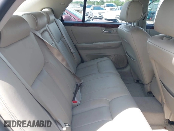 2007 Cadillac DTS Luxury I z VIN 1G6KD57Y67U123765, wystawiony jako IAAI lot #42495242 z przebiegiem 56 193 mil mil oraz . Historia ofert i sprzedaży dostępna na DreamBid. Obrazek 8.