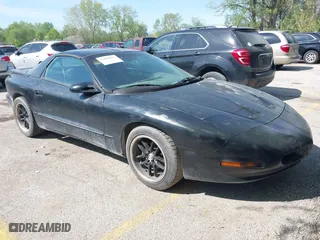 1996 Pontiac Firebird with VIN 2G2FS22K0T2231261, listed as a IAAI auction lot 42088061 with 194,913 mi miles. Bid and sale history available at carsss.com. Image 1.
