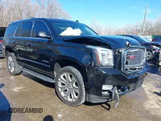 2015 GMC Yukon Denali with VIN 1GKS2CKJXFR227053, listed as a IAAI auction lot 41648799 with 190,092 mi miles. Bid and sale history available at carsss.com. Image 1.