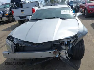2014 Chevrolet Camaro LS с VIN 2G1FA1E31E9244116, выставлен на аукционе IAAI как лот 41785264 с пробегом 96 936 миль миль и . История ставок и продаж доступна на DreamBid. Изображение 13.