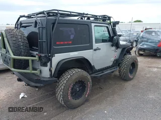 2007 Jeep Wrangler X with VIN 1J4FA24117L142513, listed as a IAAI auction lot 42314284 with 70,213 mi miles and . Bid and sale history available at DreamBid. Image 4.
