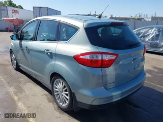 2013 Ford C-Max Hybrid SEL with VIN 1FADP5BUXDL521814, listed as a IAAI auction lot 41944352 with 130,999 mi miles. Bid and sale history available at carsss.com. Image 3.