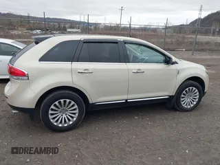 2014 Lincoln MKX with VIN 2LMDJ8JK1EBL13125, listed as a IAAI auction lot 41805340 with 100,078 mi miles. Bid and sale history available at carsss.com. Image 13.