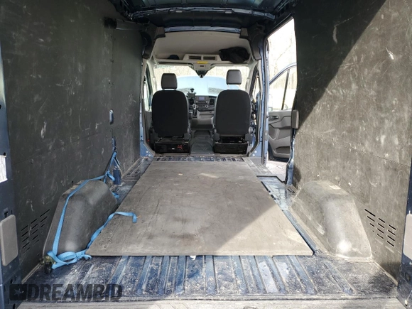 2023 Ford Transit Cargo with VIN 1FTBR1C83PKA15015, listed as a Copart auction lot 52055925 with 73,147 mi miles and Salvage Title. Bid and sale history available at carsss.com. Image 10.