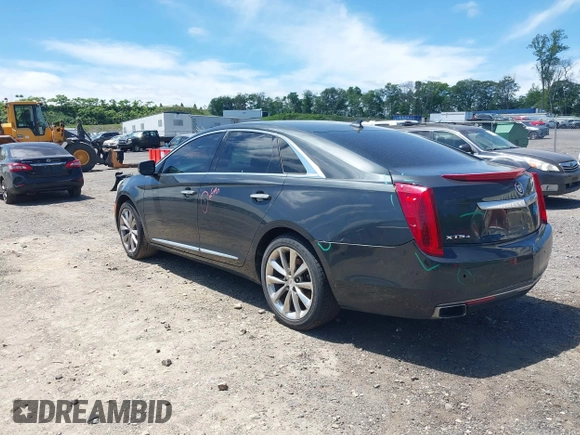 2013 Cadillac XTS Luxury z VIN 2G61R5S33D9101434, wystawiony jako IAAI lot #42290199 z przebiegiem 48 075 mil mil oraz . Historia ofert i sprzedaży dostępna na DreamBid. Obrazek 3.