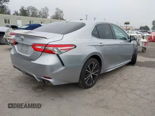 2019 Toyota Camry LE z VIN 4T1B11HK7KU713082, wystawiony jako IAAI lot #42151362 z przebiegiem 93 546 mil mil oraz . Historia ofert i sprzedaży dostępna na DreamBid. Obrazek 4.