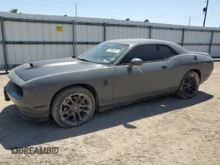 2018 Dodge Challenger R/T with VIN 2C3CDZBT3JH306026, listed as a Copart auction lot 52806725 with Not provided miles and Salvage title. Bid and sale history available at DreamBid. Image 1.