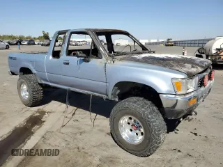 1991 Toyota Pickup DLX z VIN JT4VN13D7M5045456, wystawiony jako Copart lot #77028624 z przebiegiem Nie podano mil oraz Nie do naprawy • Non repairable. Historia ofert i sprzedaży dostępna na DreamBid. Obrazek 4.