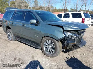 2023 Chevrolet Tahoe LS with VIN 1GNSCMKD5PR444303, listed as a IAAI auction lot 41260372 with 13,180 mi miles. Bid and sale history available at carsss.com. Image 1.