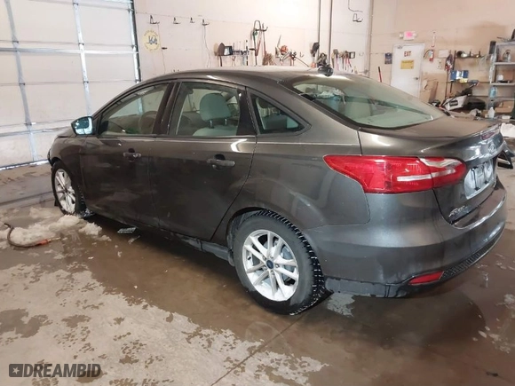 2015 Ford Focus SE with VIN 1FADP3F22FL334793, listed as a IAAI auction lot 41488994 with 58,314 mi miles. Bid and sale history available at carsss.com. Image 3.