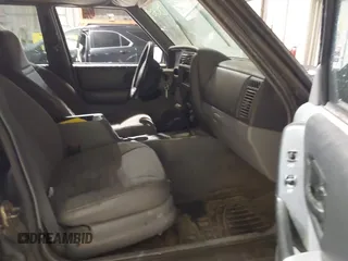 1998 Jeep Cherokee Sport z VIN 1J4FJ68S2WL142027, wystawiony jako IAAI lot #42305669 z przebiegiem 249 580 mil mil oraz . Historia ofert i sprzedaży dostępna na DreamBid. Obrazek 5.