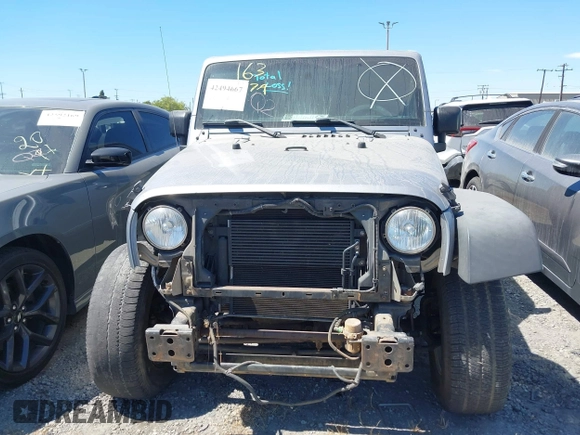 2017 Jeep Wrangler Sport with VIN 1C4GJWAG0HL621498, listed as a IAAI auction lot 42494667 with 92,284 mi miles and . Bid and sale history available at DreamBid. Image 13.
