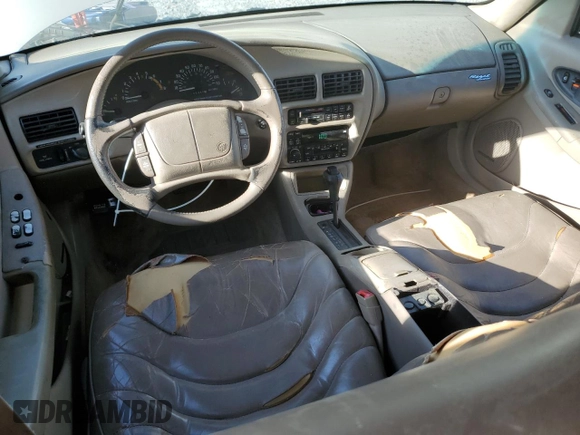 1996 Buick Regal с VIN 2G4WF52KXT1403234, выставлен на аукционе Copart как лот 52086495 с пробегом 203 388 миль миль и Списание • Salvage title. История ставок и продаж доступна на DreamBid. Изображение 8.