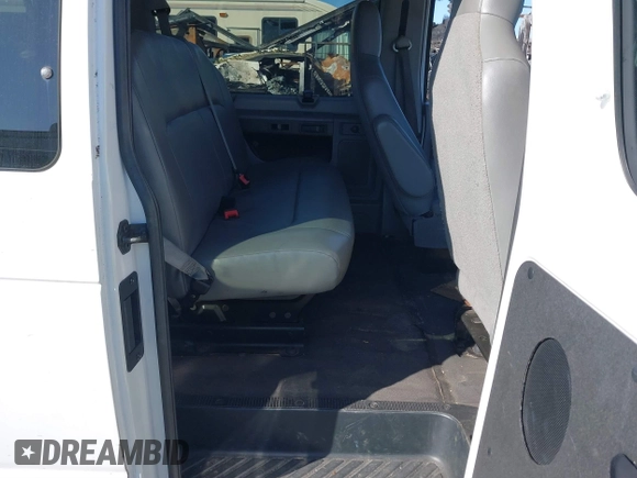 2012 Ford Econoline Passenger XL with VIN 1FMNE1BW0CDA55894, listed as a IAAI auction lot 41676338 with 159,453 mi miles and . Bid and sale history available at DreamBid. Image 8.