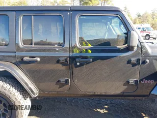 2023 Jeep Wrangler Rubicon with VIN 1C4JJXFGXPW682231, listed as a IAAI auction lot 41110264 with 15,147 mi miles and . Bid and sale history available at DreamBid. Image 13.