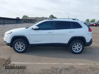 2016 Jeep Cherokee Latitude with VIN 1C4PJMCS1GW185442, listed as a IAAI auction lot 42033699 with 123,306 mi miles. Bid and sale history available at carsss.com. Image 14.