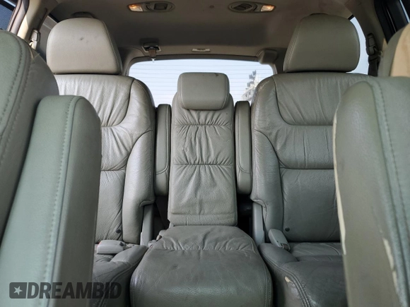 2010 Honda Odyssey EX-L z VIN 5FNRL3H74AB034608, wystawiony jako Copart lot #59262505 z przebiegiem 243 186 mil mil oraz Szkoda całkowita • Salvage title. Historia ofert i sprzedaży dostępna na DreamBid. Obrazek 10.