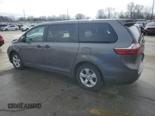 2016 Toyota Sienna L with VIN 5TDZK3DCXGS690788, listed as a Copart auction lot 43284565 with 154,559 mi miles and Salvage title. Bid and sale history available at DreamBid. Image 2.