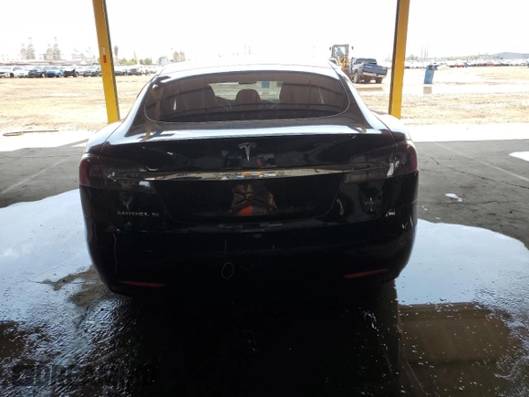 2018 Tesla Model S 75D with VIN 5YJSA1E27JF264759, listed as a Copart auction lot 59610855 with 104,375 mi miles and Salvage title. Bid and sale history available at DreamBid. Image 6.