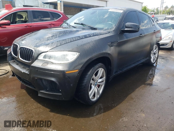2013 BMW X6 M with VIN 5YMGZ0C50D0C40144, listed as a Copart auction lot 64889554 with 91,024 mi miles and Salvage Title. Bid and sale history available at carsss.com. Image 1.