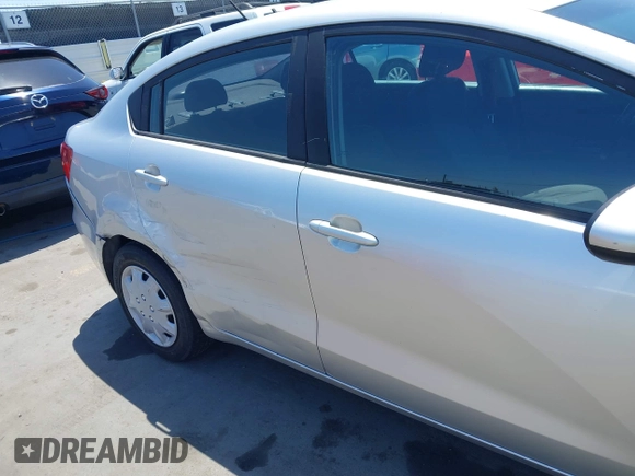 2016 Kia Rio LX with VIN KNADM4A32G6670837, listed as a IAAI auction lot 42154148 with 92,859 mi miles. Bid and sale history available at carsss.com. Image 6.