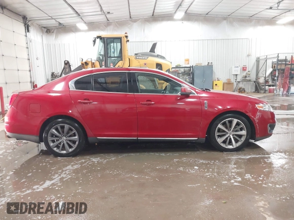 2009 Lincoln MKS with VIN 1LNHM94R59G610559, listed as a IAAI auction lot 41704552 with 168,556 mi miles. Bid and sale history available at carsss.com. Image 13.