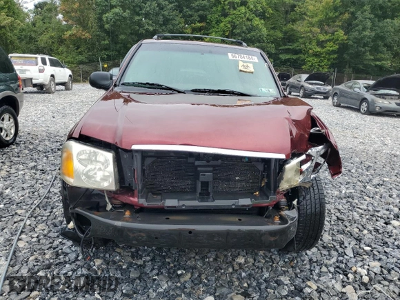 2004 GMC Envoy SLT with VIN 1GKDT13S342336784, listed as a Copart auction lot 66704184 with 169,431 mi miles and Salvage Title. Bid and sale history available at DreamBid. Image 5.