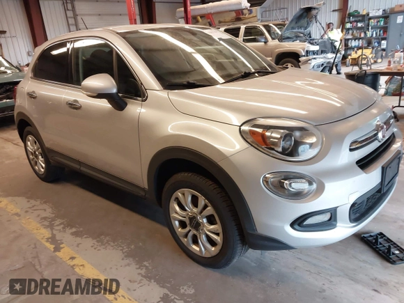 2016 FIAT 500X Lounge z VIN ZFBCFYDT0GP332060, wystawiony jako IAAI lot #42837184 z przebiegiem 159 804 mil mil oraz . Historia ofert i sprzedaży dostępna na DreamBid. Obrazek 1.