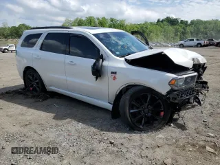 2017 Dodge Durango R/T with VIN 1C4SDJCTXHC606540, listed as a Copart auction lot 57125365 with 141,591 mi miles and Salvage title. Bid and sale history available at DreamBid. Image 4.
