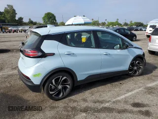 2023 Chevrolet Bolt EV 2LT with VIN 1G1FX6S04P4122510, listed as a Copart auction lot 60584705 with 12,291 mi miles and Salvage title. Bid and sale history available at DreamBid. Image 3.