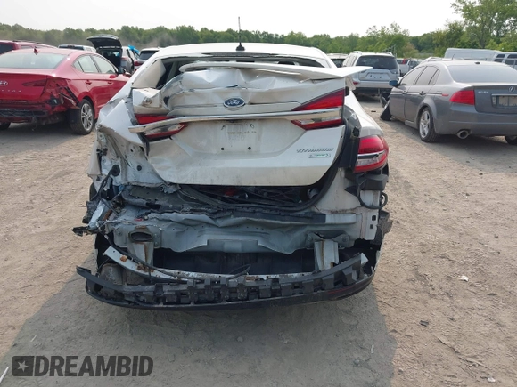 2017 Ford Fusion Titanium z VIN 3FA6P0K92HR396113, wystawiony jako IAAI lot #42402969 z przebiegiem 185 620 mil mil oraz . Historia ofert i sprzedaży dostępna na DreamBid. Obrazek 16.