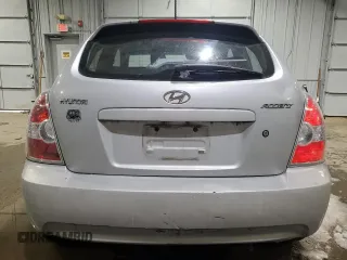 2007 Hyundai Accent SE with VIN KMHCN36C37U046518, listed as a Copart auction lot 43459955 with 118,356 mi miles and Salvage Title. Bid and sale history available at carsss.com. Image 6.