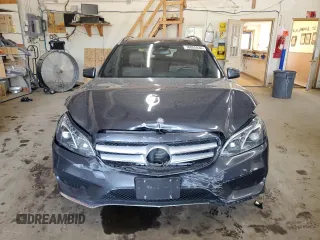 2015 Mercedes-Benz E 350 Luxury with VIN WDDHH8JB0FB134830, listed as a Copart auction lot 70855934 with 106,717 mi miles and Salvage title. Bid and sale history available at DreamBid. Image 5.