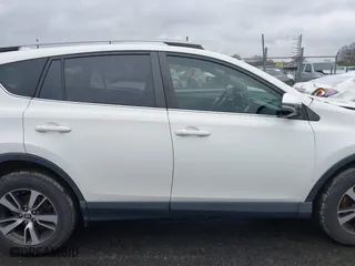 2017 Toyota RAV4 XLE with VIN JTMRFREV6HJ716907, listed as a IAAI auction lot 41056444 with 118,335 mi miles. Bid and sale history available at carsss.com. Image 13.
