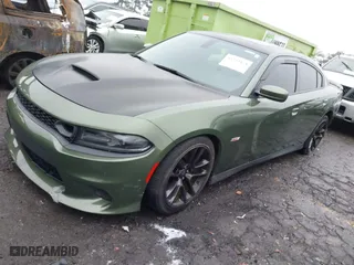 2021 Dodge Charger Scat Pack with VIN 2C3CDXGJ8MH616219, listed as a IAAI auction lot 41394474 with 59,434 mi miles. Bid and sale history available at carsss.com. Image 21.