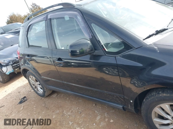 2013 Suzuki SX4 Crossover z VIN JS2YB5A35D6100607, wystawiony jako IAAI lot #41605648 z przebiegiem 64 685 mil mil oraz . Historia ofert i sprzedaży dostępna na DreamBid. Obrazek 13.